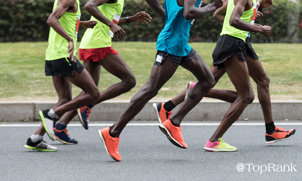 Marathon runners racing image.