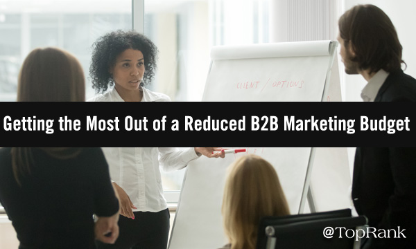 B2B content marketing making small budgets do big things marketing leader converses with team at whiteboard image
